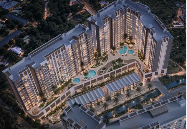 Aerial dusk view of Gurara and Zambezi Towers with resort pools and townhouses