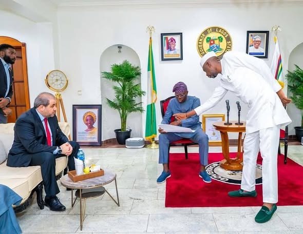Lagos State officials reviewing the Reportage Tower documents